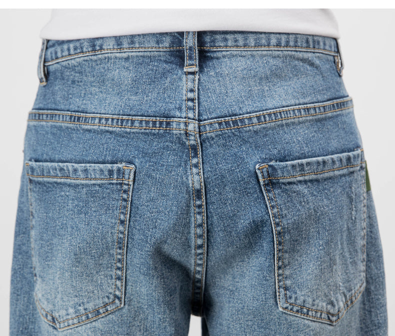 Men’s Light Washed Ripped Tapered Jeans – Loose Fit Stretch Denim