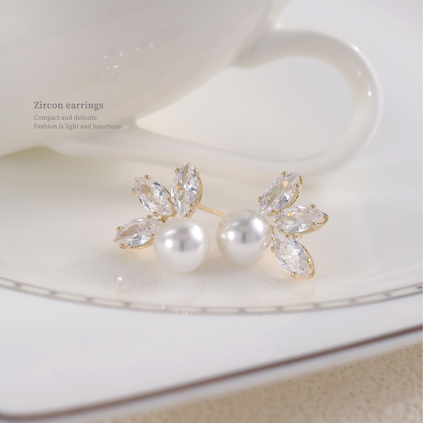 925 High-grade Three-petal Zircon Leaf Earrings