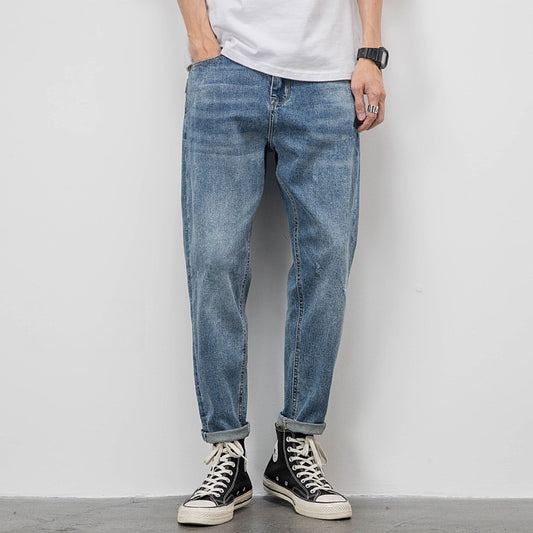 Men’s Light Washed Ripped Tapered Jeans – Loose Fit Stretch Denim