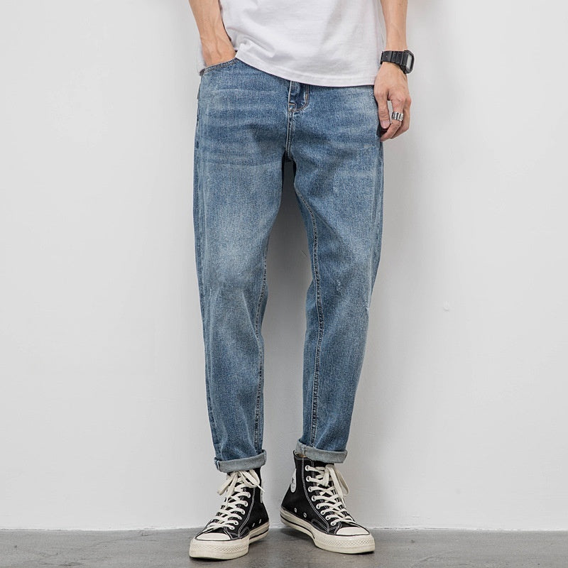 Men’s Light Washed Ripped Tapered Jeans – Loose Fit Stretch Denim