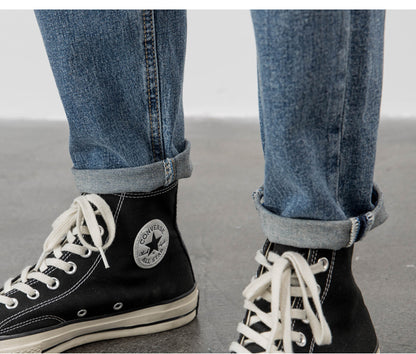 Men’s Light Washed Ripped Tapered Jeans – Loose Fit Stretch Denim