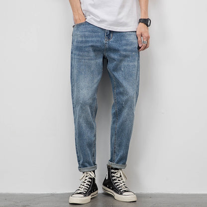 Men’s Light Washed Ripped Tapered Jeans – Loose Fit Stretch Denim